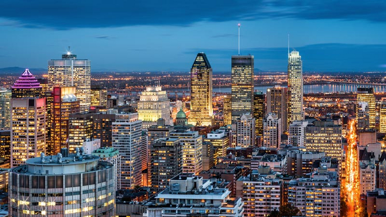 Kanada-Montreal-Skyline-Abend-AdobeStock_648709014.jpg